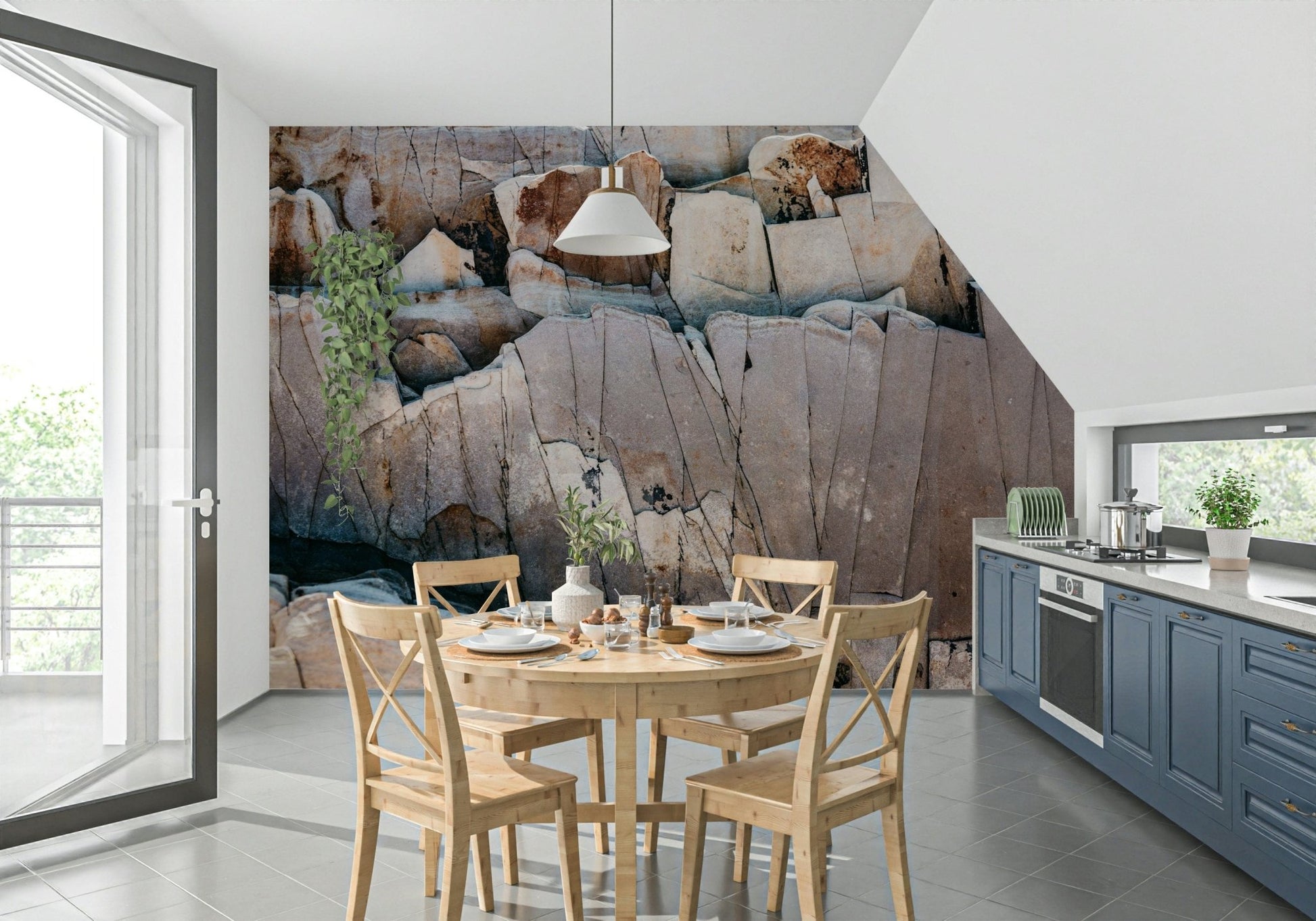 Stone Geometry wallpaper mural of cracked rock in a kitchen nook with round wood table and blue-grey cabinets