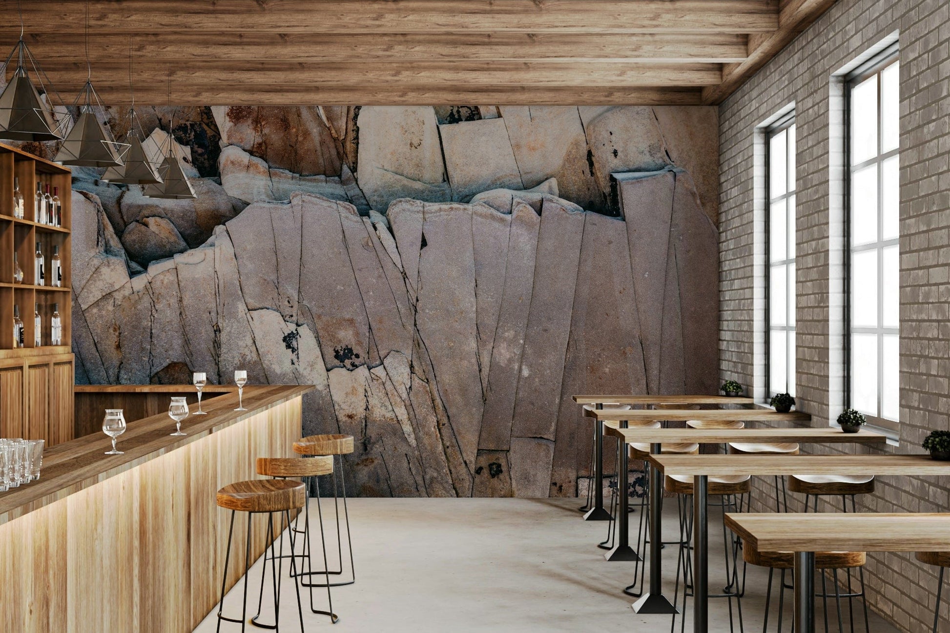 Stone Geometry wallpaper mural of fractured rock in a bar with wood counter, stools and exposed brick wall