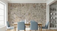 Realistic stone mosaic wall mural with varied shapes, sizes, and shades for three-dimensional depth.