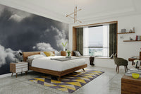 A minimalist interior with the cloud-themed wallpaper.