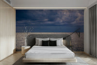 A peaceful seaside view mural on decorative wallpaper.

