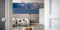 A beautiful coastal rock wallpaper mural with crashing waves.

