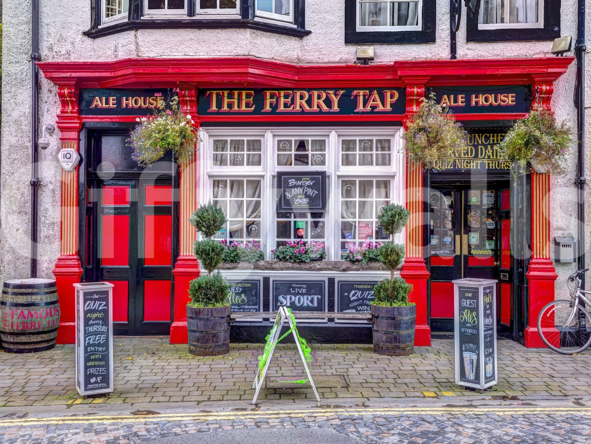 Cafe street mural with classic signs and cozy ambiance

