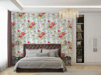 Soft rose blooms arranged over a layered stripe background.


