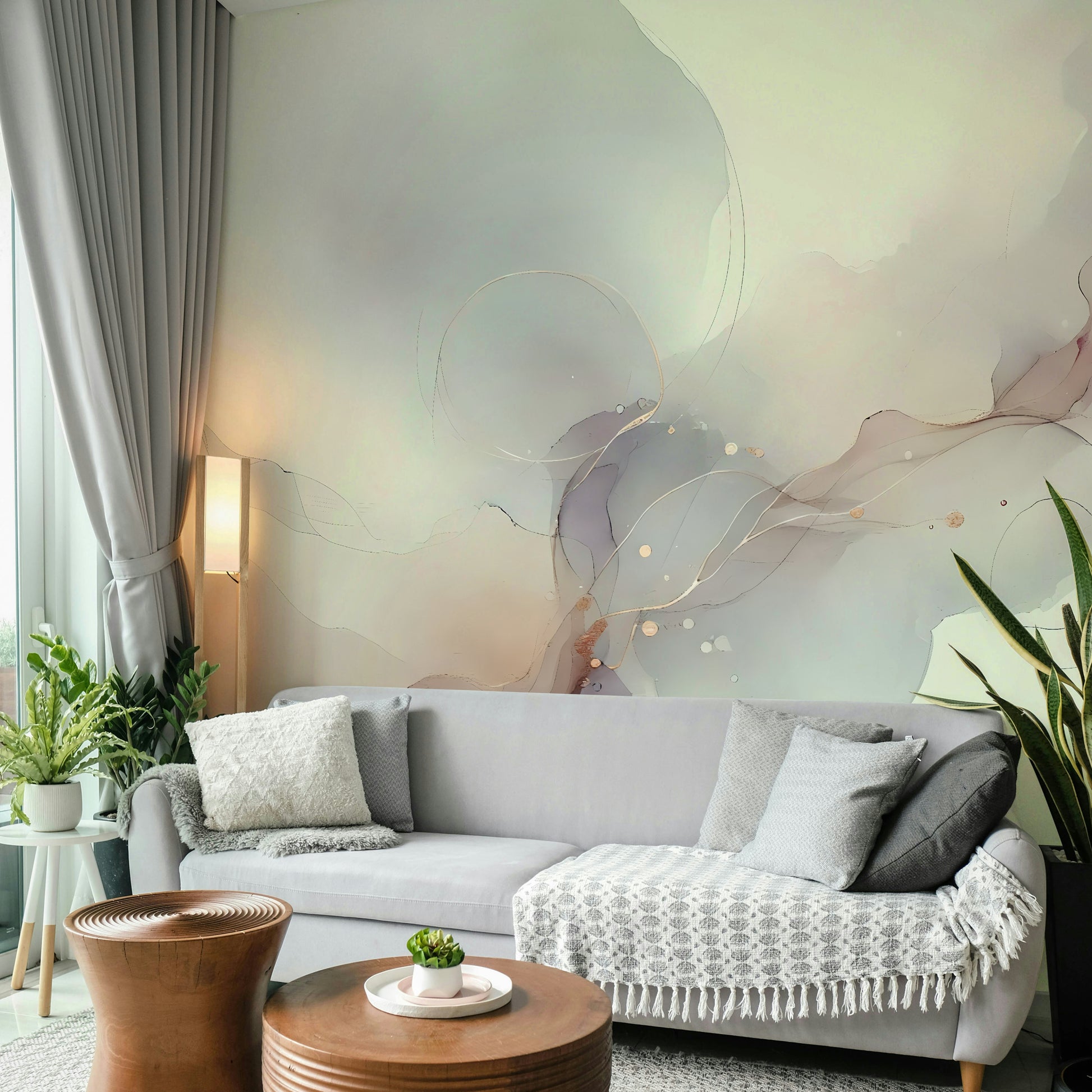 Boho style nursery with a soft green airy botanical wallpaper design.