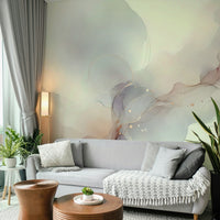 Boho style nursery with a soft green airy botanical wallpaper design.