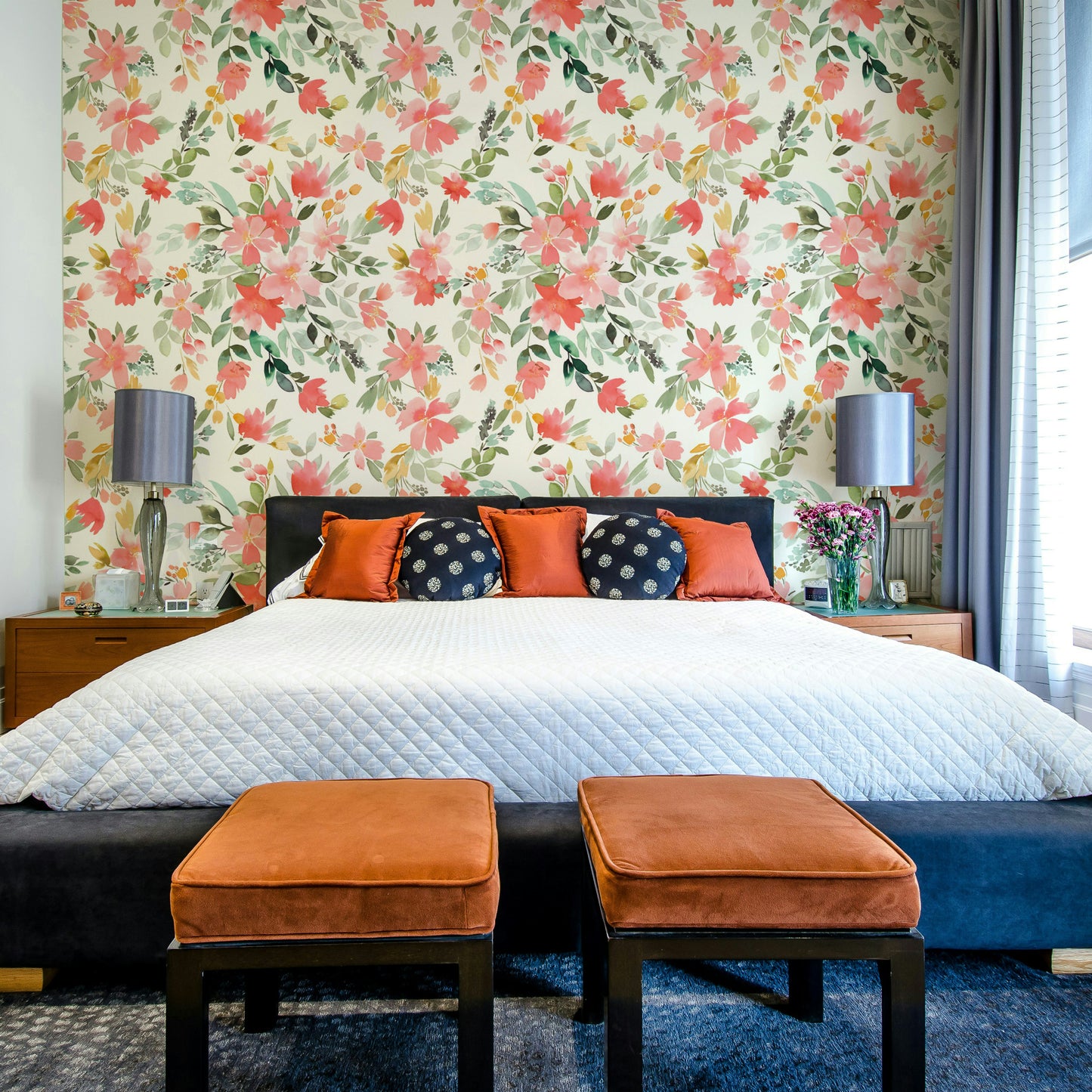 Floral wallpaper with coral oleanders and natural green plant details.

