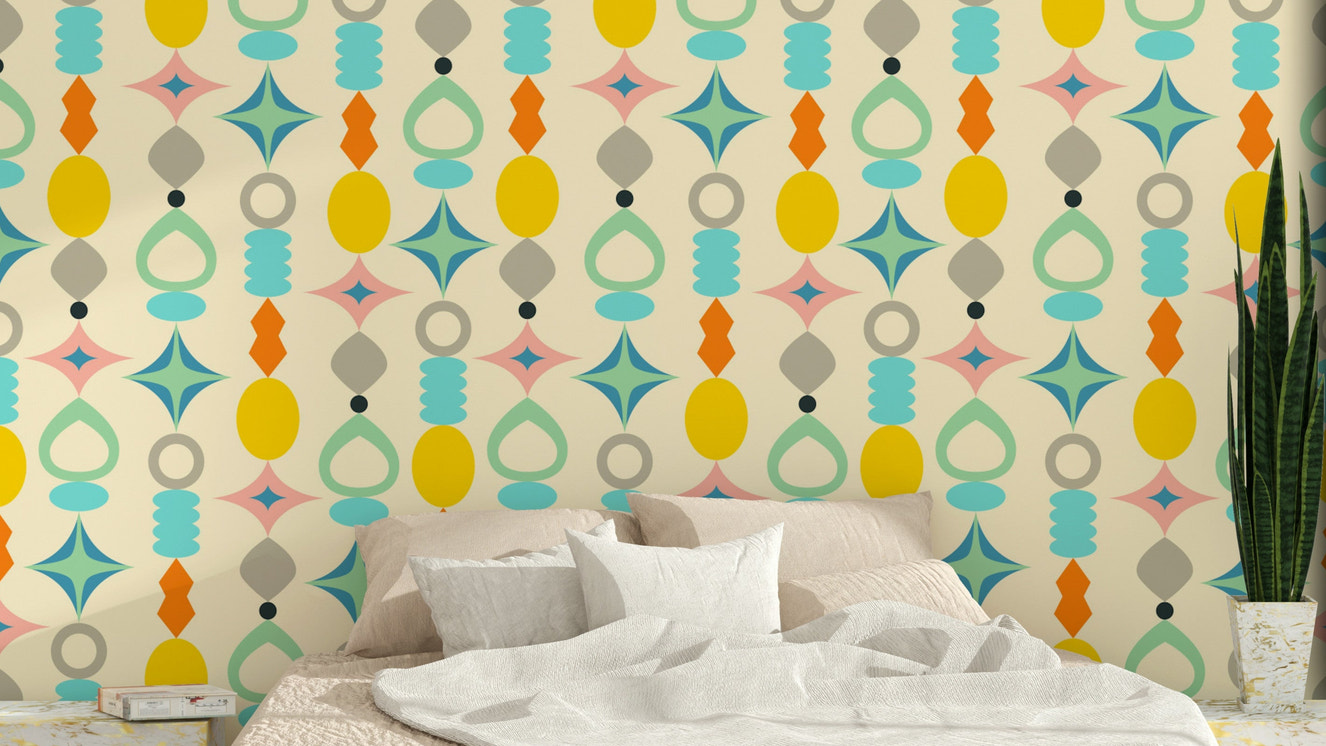 Mid-century modern wallpaper with colorful abstract shapes and a neutral cream base.

