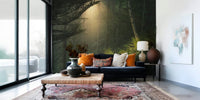 Lush green forest wall mural defines lounge interior
