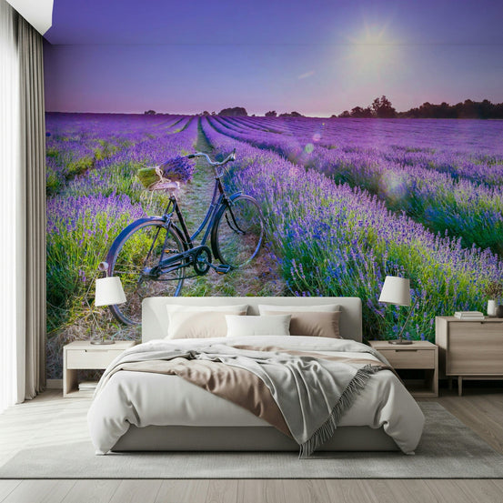 Sunlit Lavender Escape wallpaper mural of a bicycle in a purple lavender field at sunset behind a bed with wooden nightstands