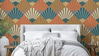 The colors are soft, muted tones of navy blue, orange, green, beige, and cream.

