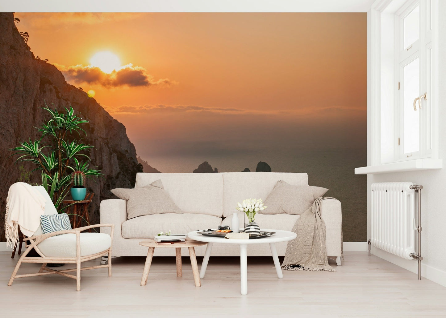 Warm dawn sky wall mural over rocky shore