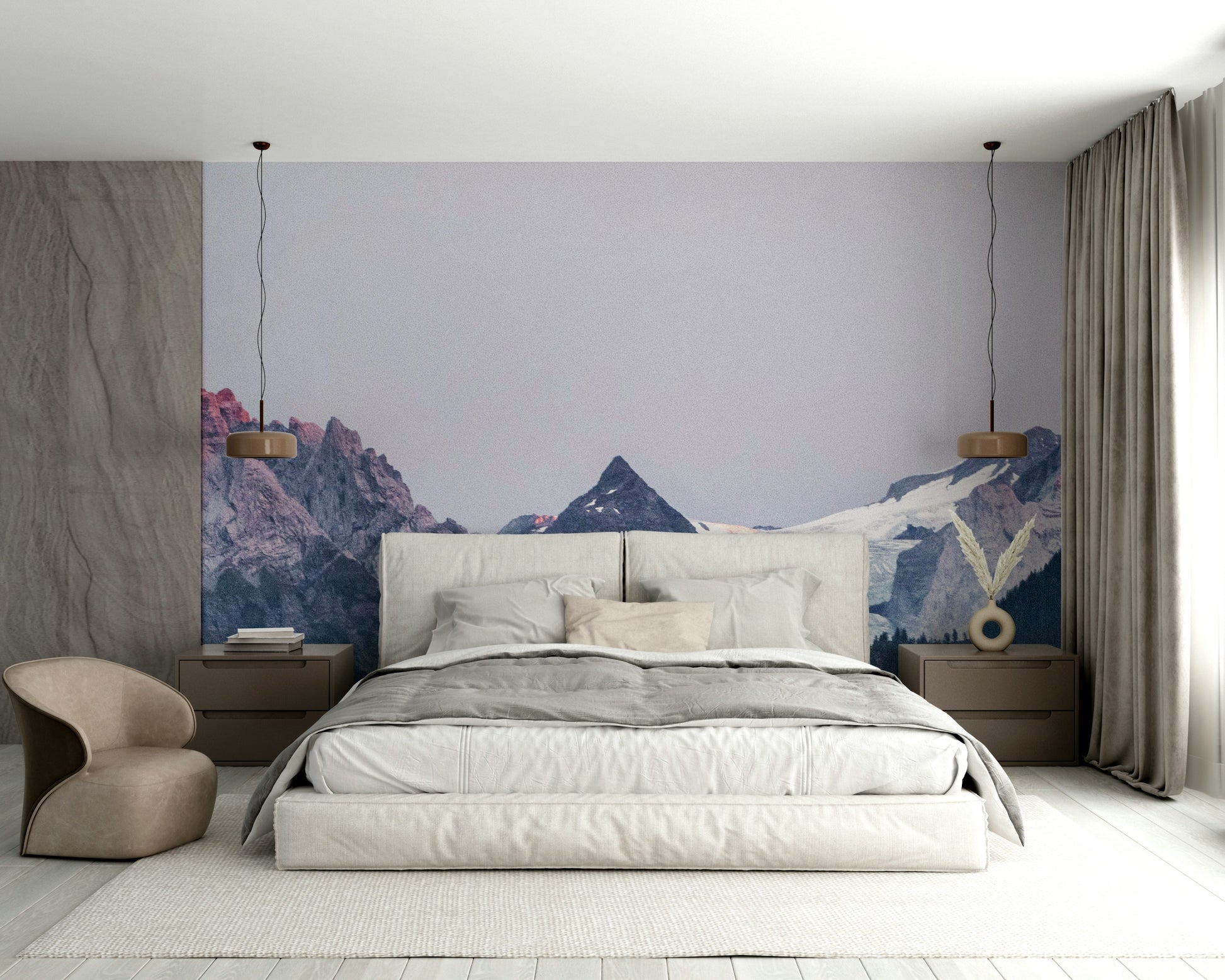 Sunset Mountain Vista wall mural behind a beige upholstered bed with two pendant lamps in a bedroom