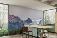 Sunset Mountain Vista wall mural in a kitchen with a sage green island, wood counter and red stool