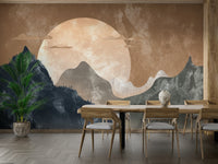 Large scale nature mural with a golden horizon behind a mid-century modern sofa.
