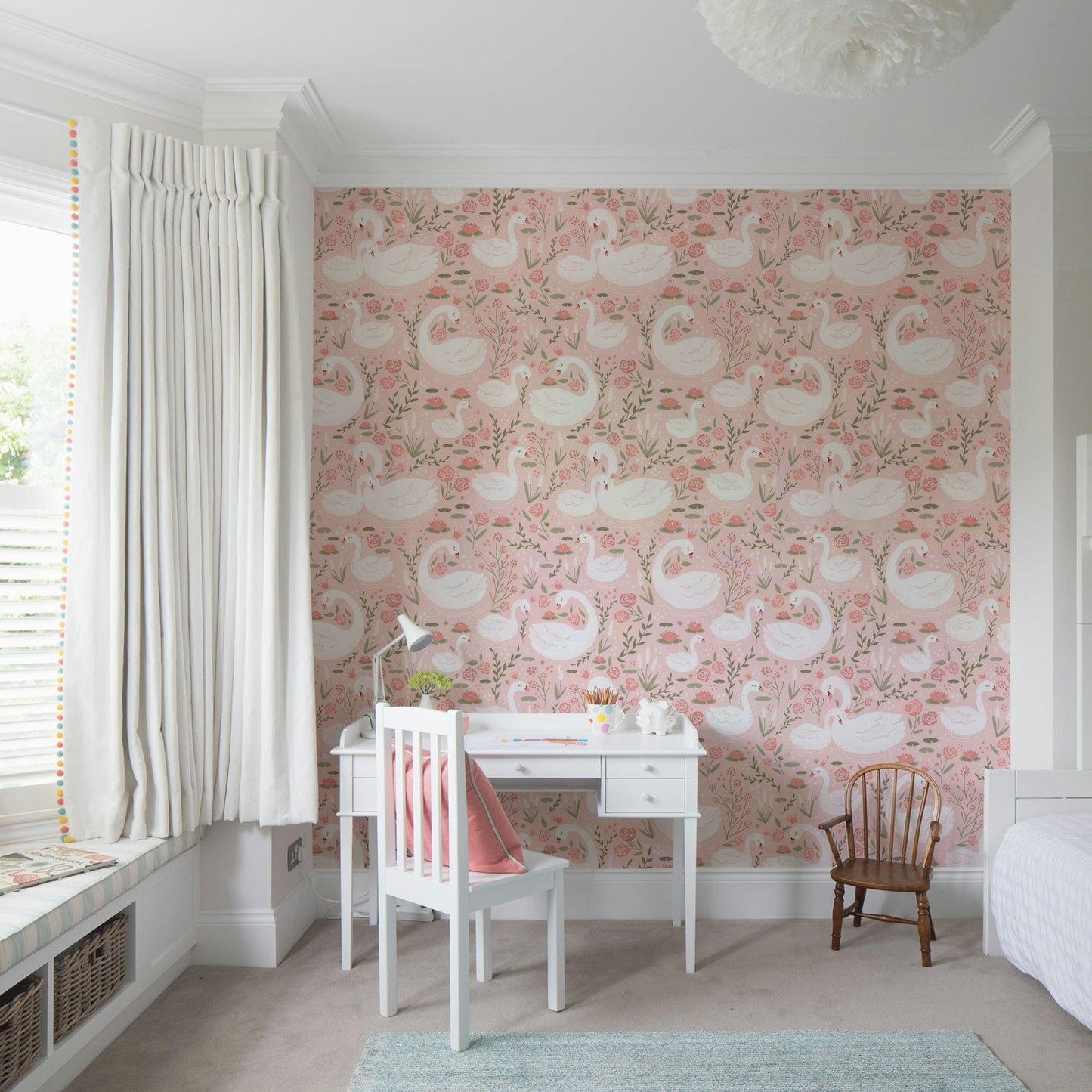 Enchanting wallpaper showing swans gliding through a magical flower garden.