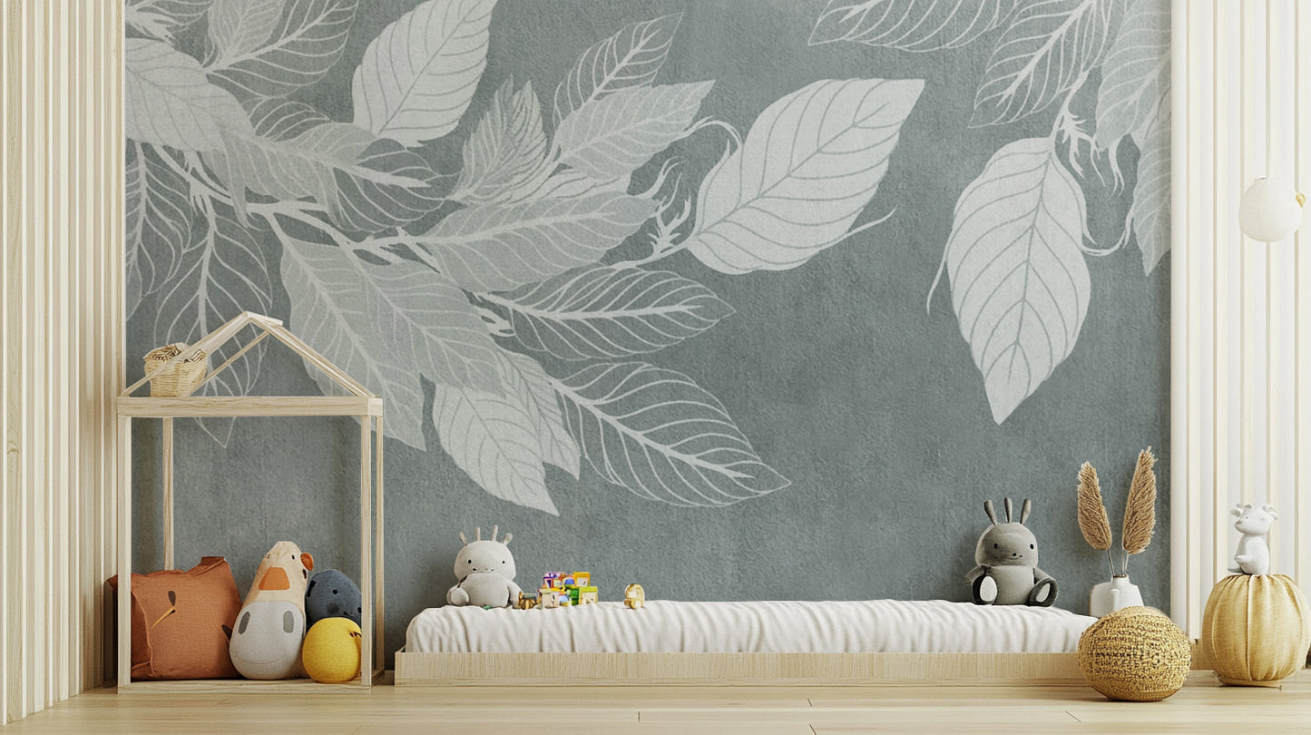 Elegant Teal Botanical Leaf wallpaper mural with white leaves behind a low daybed with plush toys in a kids play room