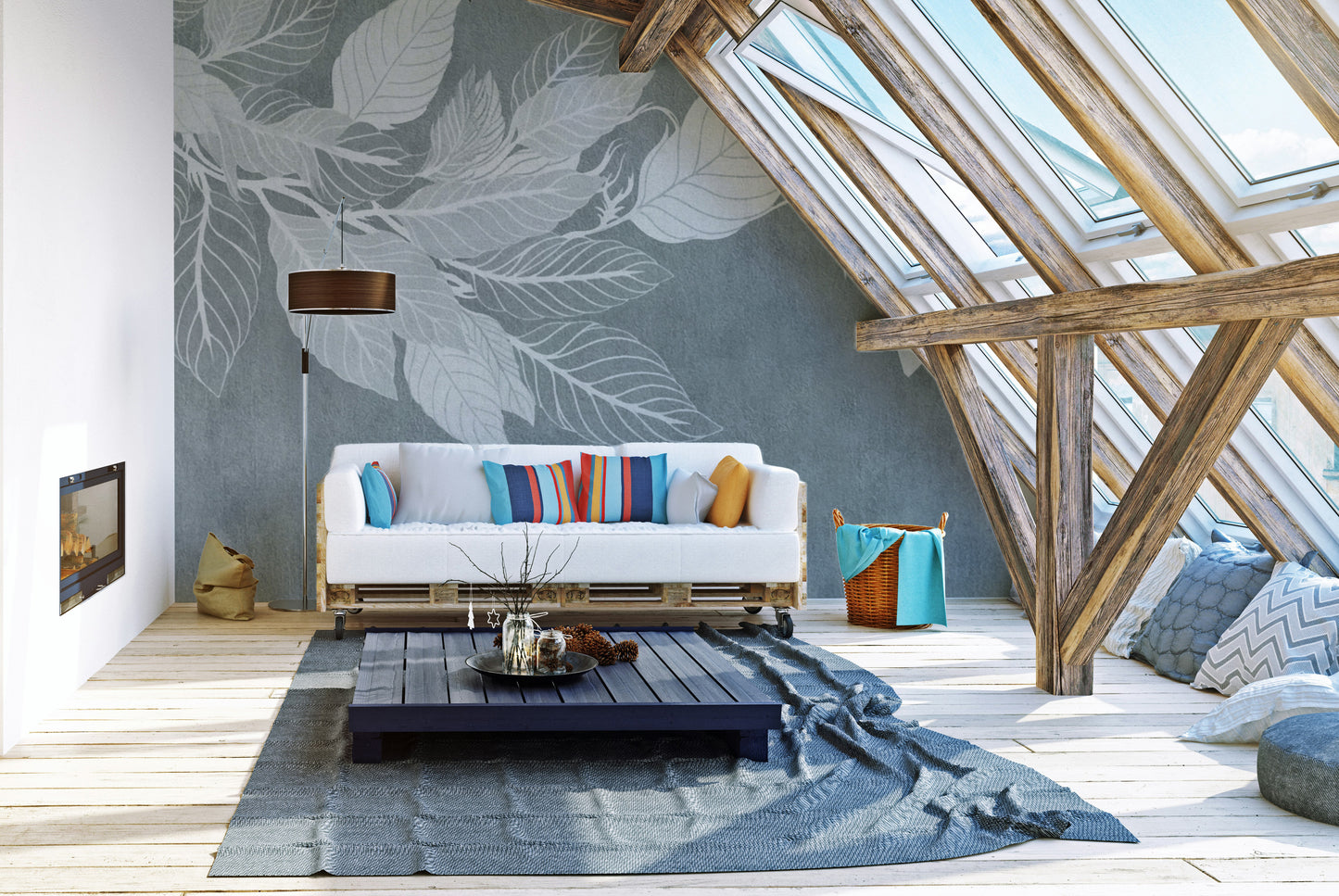 Elegant Teal Botanical Leaf wallpaper mural with pale leaves behind a white pallet sofa in an attic loft living room