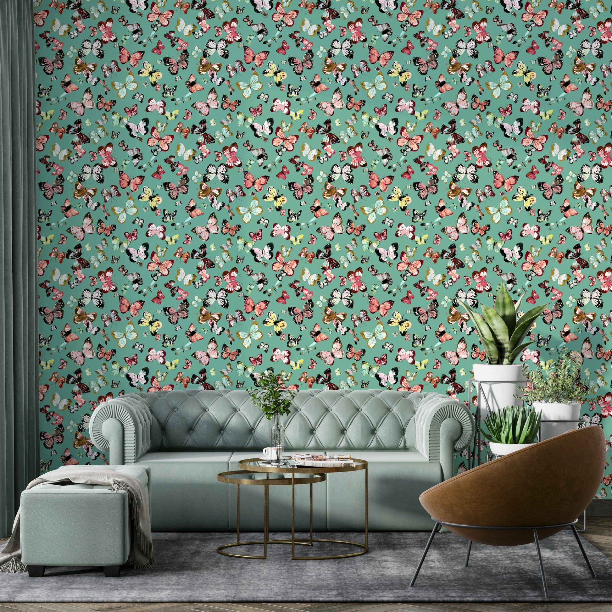 Flying Butterflies Colorful Teal Coral wallpaper behind a sage green chesterfield sofa and brown chair