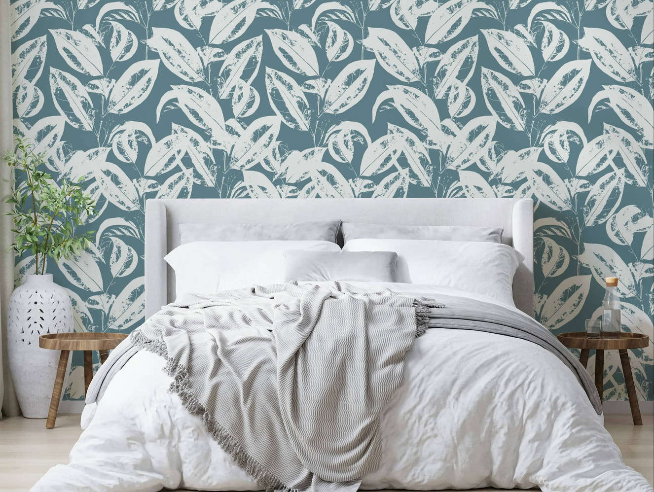 The image features stylized or abstract leaf shapes in various sizes.
