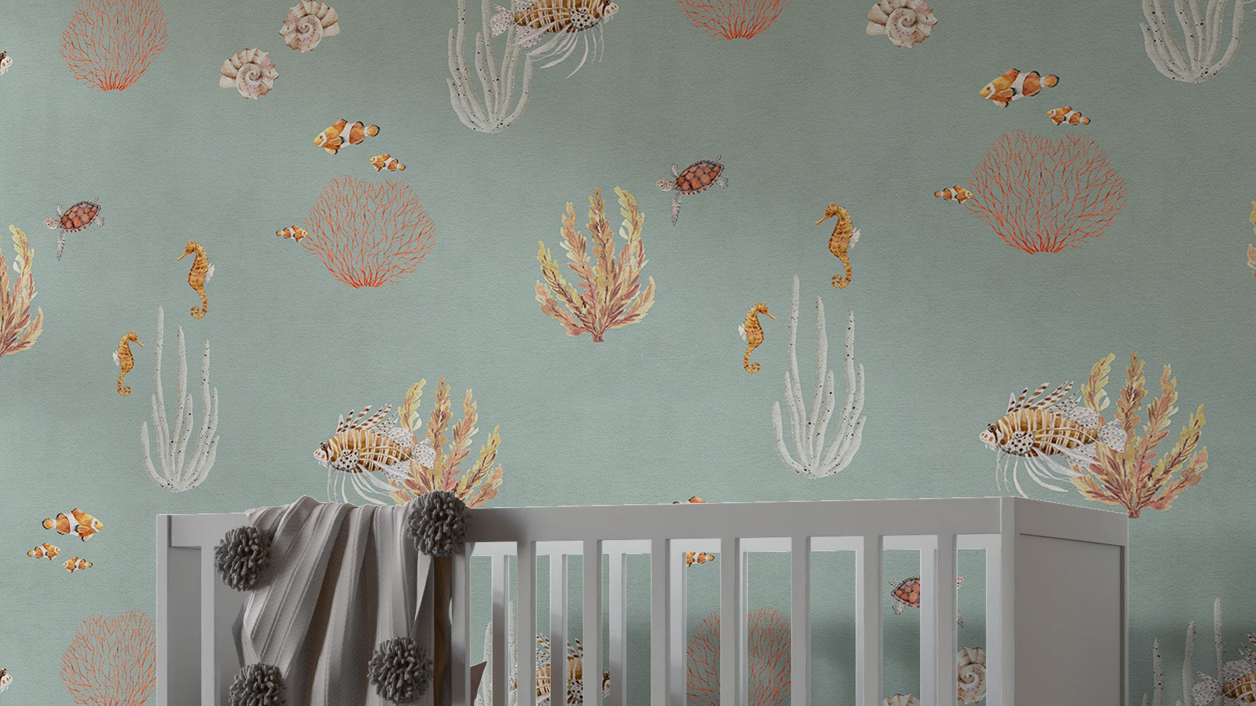 Teal Oceanic Wonders wall mural with seahorses and coral above a gray crib in a nursery