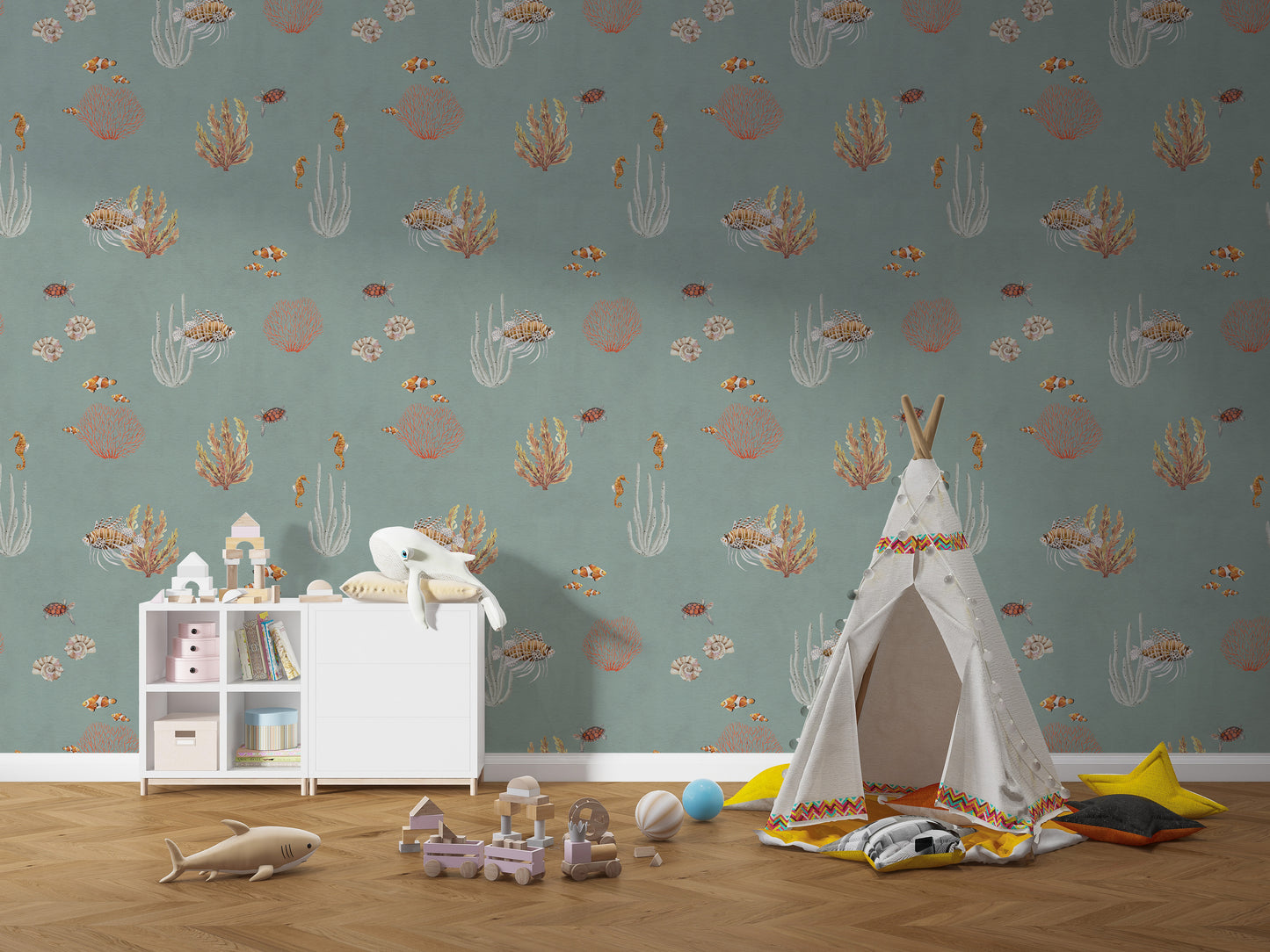 Teal Oceanic Wonders wall mural beside a white teepee, dresser and wooden shark toy
