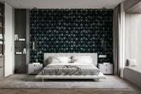 Overlapping teal triangles in a contemporary mural design.

