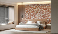 Vivid terra-cotta natural wallpaper. Bold white aggregate backdrop.