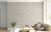 Rustic beige brick wallpaper mural with worn finish for a farmhouse or loft-inspired aesthetic.