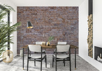 Weathered brick wallpaper mural with a mix of warm and neutral tones for stylish interior design.