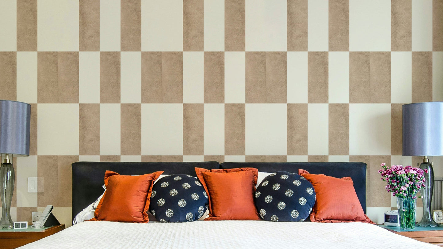 Textured Taupe & White wallpaper mural in a checkerboard print behind a navy bed with orange and blue pillows