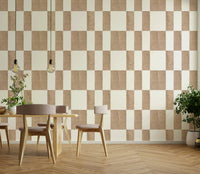 Textured Taupe & White checkerboard wallpaper mural in a dining room with a wood table and pendant bulbs