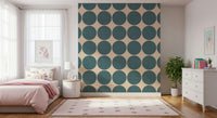 Wallpaper featuring large teal round shapes repeated in neat rows for a modern, graphic look