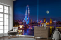 The colors are muted and gentle, with deep blues and soft golden lights.

