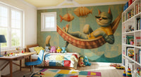 The Cat's Seaside Siesta wallpaper mural over a patchwork-quilt bed with a blue chair, desk and full bookshelf