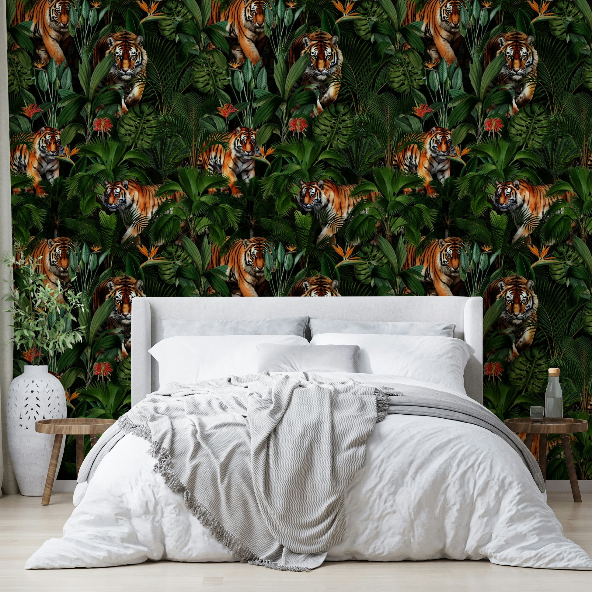 Tropical wallpaper with a tiger design and lush botanical accents

