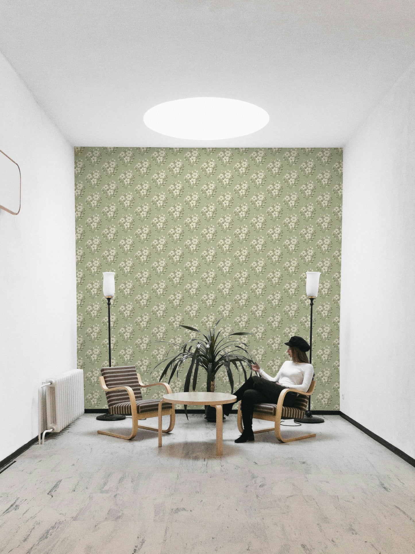 Botanical bouquet print on soft green wallpaper

