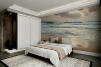 A wall mural featuring a serene beach scene.

