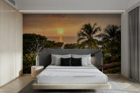 Tranquil Hawaii Island Sunset wallpaper mural with an ocean sunset behind a platform bed and grey headboard