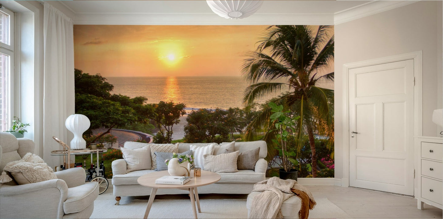 Tranquil Hawaii Island Sunset wallpaper mural of a glowing sea sunset and palm above a cream living room sofa