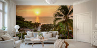 Tranquil Hawaii Island Sunset wallpaper mural of a glowing sea sunset and palm above a cream living room sofa