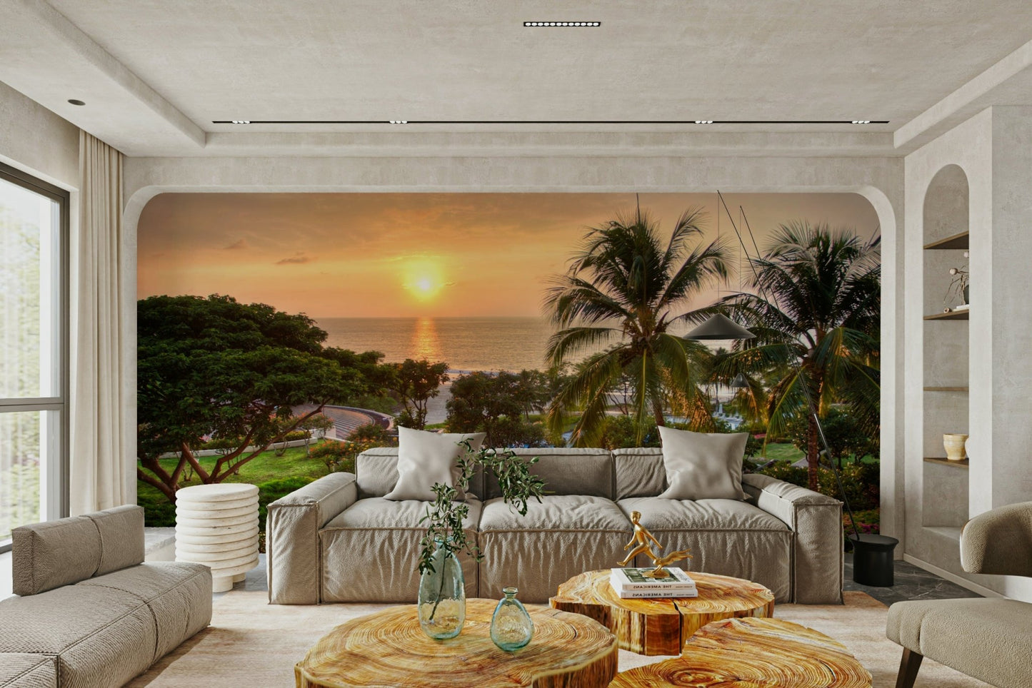 Tranquil Hawaii Island Sunset wallpaper mural of a sea sunset and palms above a beige sofa and wood-slice tables