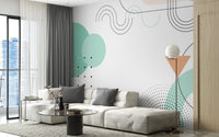 Geometric Shapes wallpaper mural styled along a hallway feature wall near a console in white tones