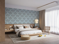 Grey Damask pattern wallpaper styled as a living room feature wall behind a sofa and seating