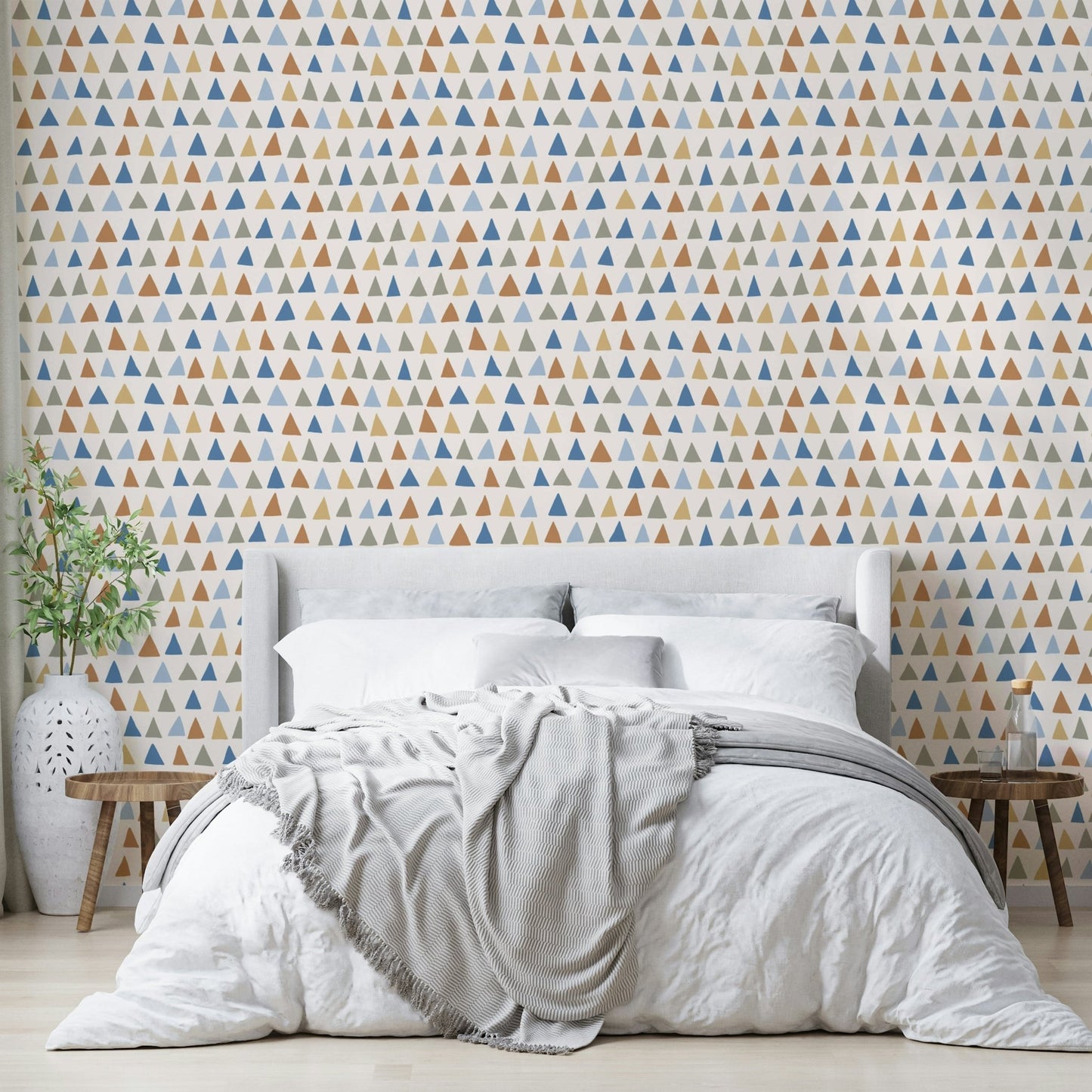 Triangle wall pattern in terracotta, teal, and mustard hues.

