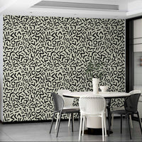 Unique hand drawn geometric shapes accent wallpaper

