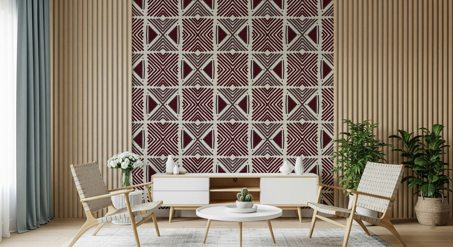African inspired print wallpaper bold, dark magenta triangles and linear detail.