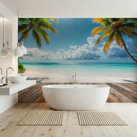 Tropical Beach View wallpaper mural of palms and turquoise sea behind a freestanding white tub in a modern bathroom