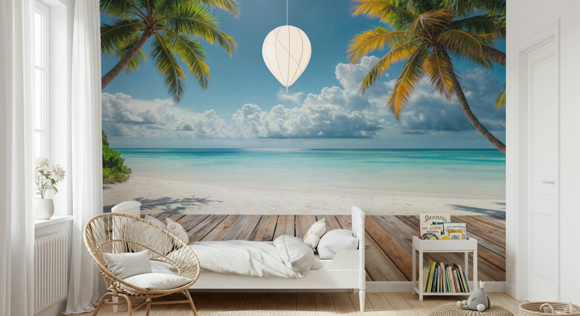 Tropical Beach View wallpaper mural of palms and ocean above a white daybed and rattan chair in a kids room
