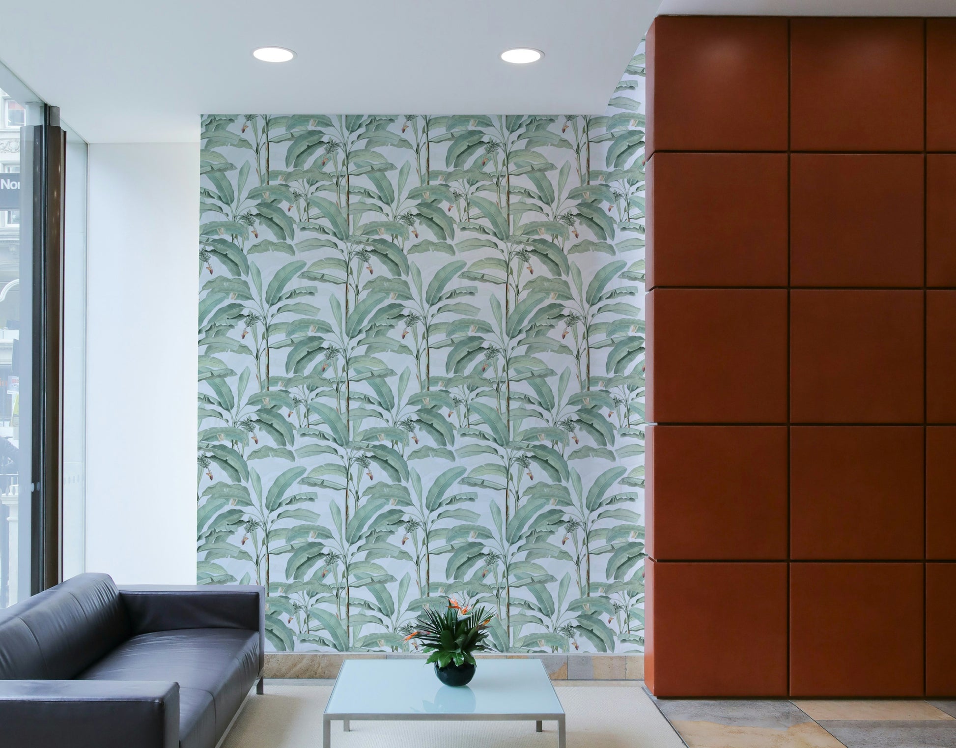 Tropical Botanical Dream Wallpaper with bold palm leaves and tropical flowers.

